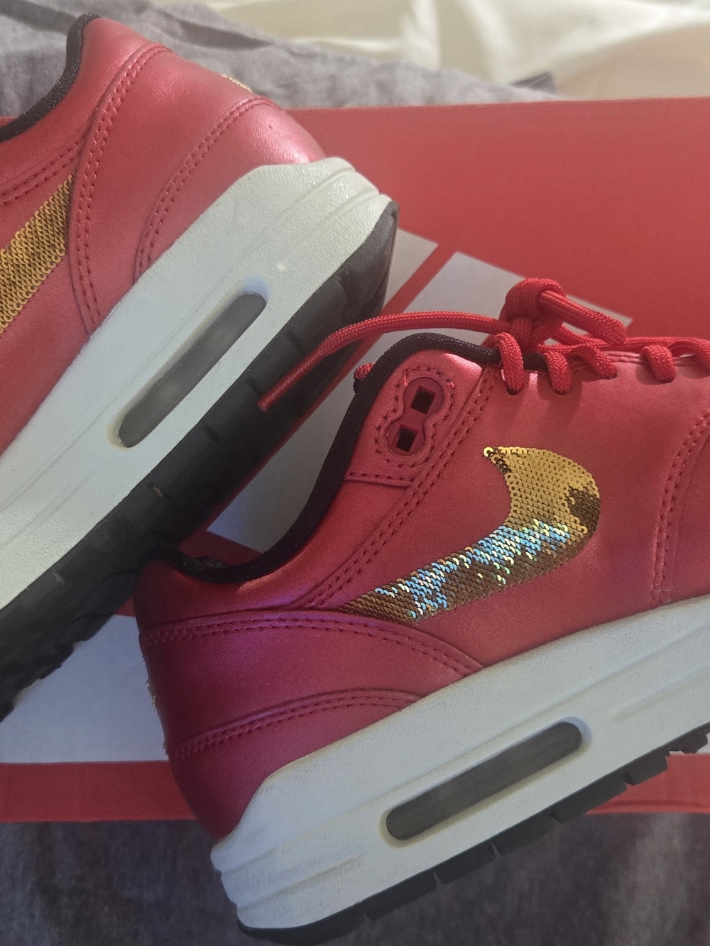 Nike Women’s Air Max 1 Red Sneakers with Gold Sequin Swoosh